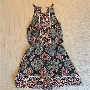 Pink and black floral print romper